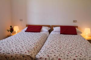 Postel nebo postele na pokoji v ubytování Residence Geranio + 32 fotografií