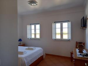 T2,Casa Sol e Mar 50464/AL客房内的一张或多张床位