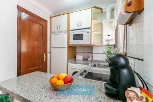 A kitchen or kitchenette at HH Casa Chica