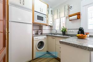 A kitchen or kitchenette at HH Casa Chica
