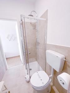 Koupelna v ubytování Hotel Ambassador