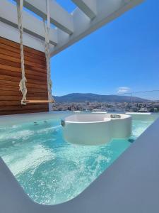 The swimming pool at or near The One 360 Skyline Penthouse Athens