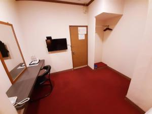 TV a/nebo společenská místnost v ubytování Long Cherng Hotel + 26 fotografií