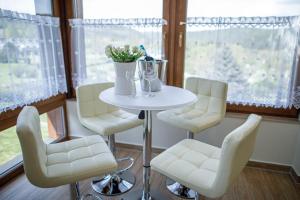 Posezení v ubytování Hotel Villa Golf Cihelny