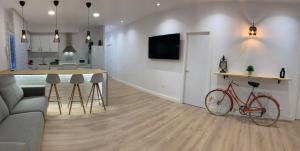 Kuchyň nebo kuchyňský kout v ubytování APARTAMENTOS SANTULLANO 1
