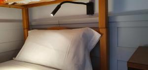 A bed or beds in a room at espai Abadia
