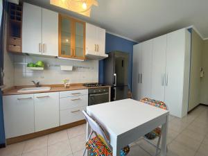 Η κουζίνα ή μικρή κουζίνα στο Chicco Light by Cinelli Apartment