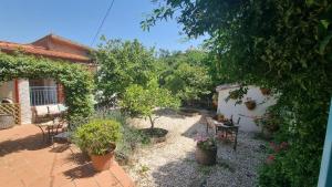 Vonkajšia záhrada v ubytovaní Giardino Dei Limoni Apartment