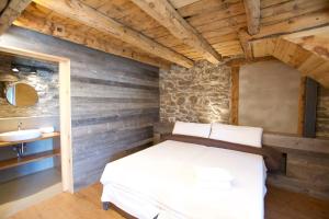 Katil atau katil-katil dalam bilik di Apartament Cal Josepó