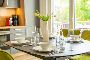 Příslušenství pro přípravu čaje a kávy v ubytování Apartment "Marco Polo" - Haffresidenz