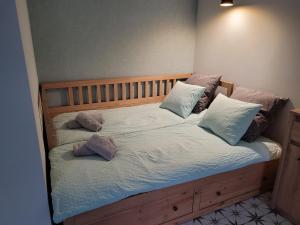Posteľ alebo postele v izbe v ubytovaní Apartament 23 - Klimaty Bałtyku