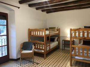 A bed or beds in a room at espai Abadia