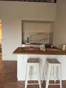 A kitchen or kitchenette at Coralli 8 - Residence Sole Ruju