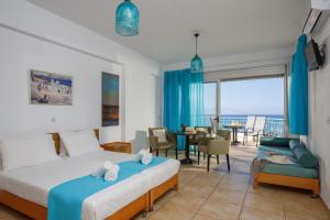 Ένα ή περισσότερα κρεβάτια σε δωμάτιο στο Romantica Beach +75 φωτογραφίες