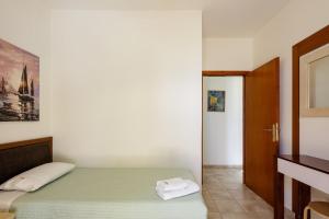 Voodi või voodid majutusasutuse Stavromenos Villas - Private Pools & Seaview - 500m from Beach toas
