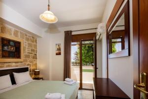 Voodi või voodid majutusasutuse Stavromenos Villas - Private Pools & Seaview - 500m from Beach toas