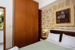 Voodi või voodid majutusasutuse Stavromenos Villas - Private Pools & Seaview - 500m from Beach toas