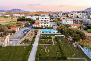 an aerial view of a resort with a swimming pool at Hotel Tsagarakis Beach in Amoudara Herakliou