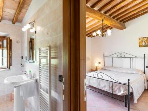 Posteľ alebo postele v izbe v ubytovaní Apartment Le Buche-4 by Interhome