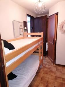 Ένα ή περισσότερα κρεβάτια σε δωμάτιο στο Balcons du soleil 12