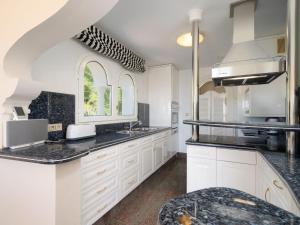 A kitchen or kitchenette at Villa Luxemburg by Interhome