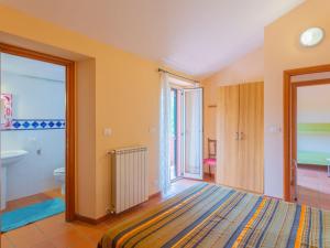 Posteľ alebo postele v izbe v ubytovaní Apartment Contrada Brecciano-1 by Interhome