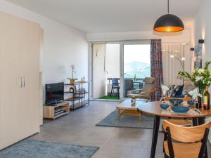 Posezení v ubytování Apartment Residenza Monte Bré - Apt-204 Haus2 by Interhome + 21 fotografií