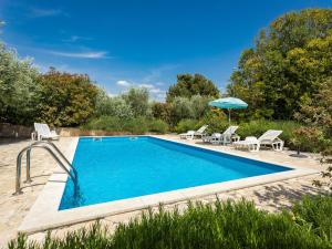 Πισίνα στο ή κοντά στο Apartment Giuliano-2 by Interhome