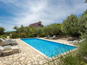 Πισίνα στο ή κοντά στο Apartment Giuliano-4 by Interhome