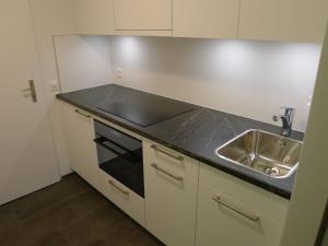 Apartment Utoring Acletta-44 by Interhomeにあるキッチンまたは簡易キッチン
