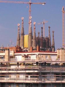 a building under construction with cranes on top of it at The Best Barcelona in Barcelona