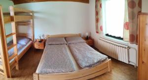 Postel nebo postele na pokoji v ubytování Apartmány Anna s bazénem a welness