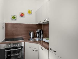 Η κουζίνα ή μικρή κουζίνα στο Apartment Top C 34 by Interhome +31 φωτογραφίες