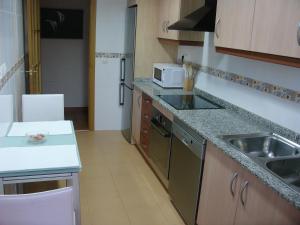 Una cocina o zona de cocina en Playa y Montaña Faura-Valencia