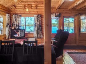 Et opholdsområde på Holiday Home Honkala by Interhome