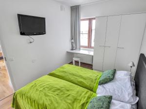 En eller flere senger på et rom på Holiday Home Nordic chalet 9506 by Interhome