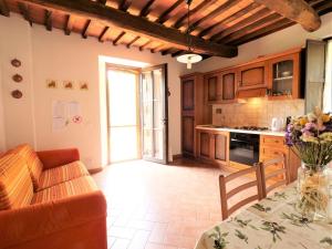 A kitchen or kitchenette at Apartment Pian dei Carpini - Janis by Interhome