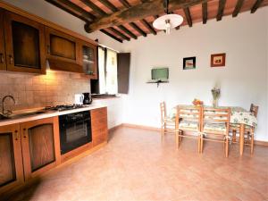 A kitchen or kitchenette at Apartment Pian dei Carpini - Janis by Interhome Még 23 kép