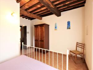 A bed or beds in a room at Apartment Pian dei Carpini - Janis by Interhome