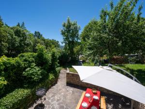 Vonkajšia záhrada v ubytovaní Holiday Home Alexandra by Interhome