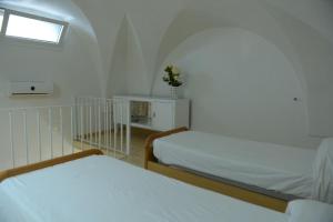 Posteľ alebo postele v izbe v ubytovaní Attico Palma