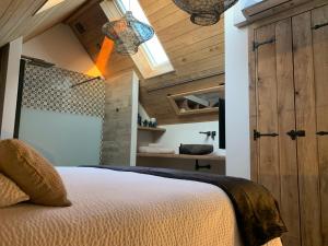Postel nebo postele na pokoji v ubytování Vakantiewoning 't Rysselhof
