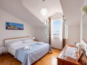 Posteľ alebo postele v izbe v ubytovaní Apartment Niko 1 by Interhome