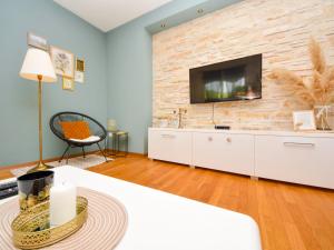 TV a/nebo společenská místnost v ubytování Holiday Home Stipe by Interhome + 23 fotografií