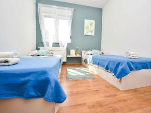 Postel nebo postele na pokoji v ubytování Holiday Home Stipe by Interhome
