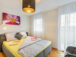 Postel nebo postele na pokoji v ubytování Apartment Tasman S20-R by Interhome
