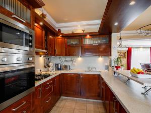 A kitchen or kitchenette at Holiday Home Szabo by Interhome