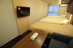 Кровать или кровати в номере HIZ HOTEL Kyoto Nijo Castle - Vacation STAY 12567v