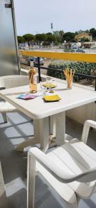 Балкон или терраса в La Cigale de Mer à 100 m de la Plage et du Centre Ville du Grau du Roi