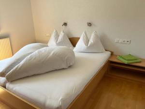 מיטה או מיטות בחדר ב-Appartement Bellevue